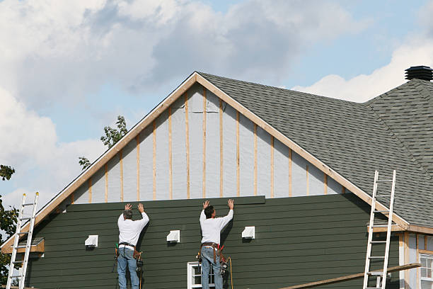Professional Siding Repair technician working in Utica, PA